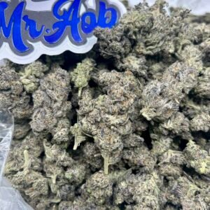 Buy Jelly Roll strain online — bright green buds with purple flecks and sticky resin from NTTD Mr. Aob